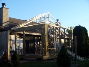 three season room trusses going up