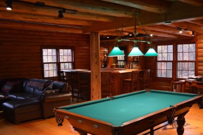 billiard table with three overhead lights