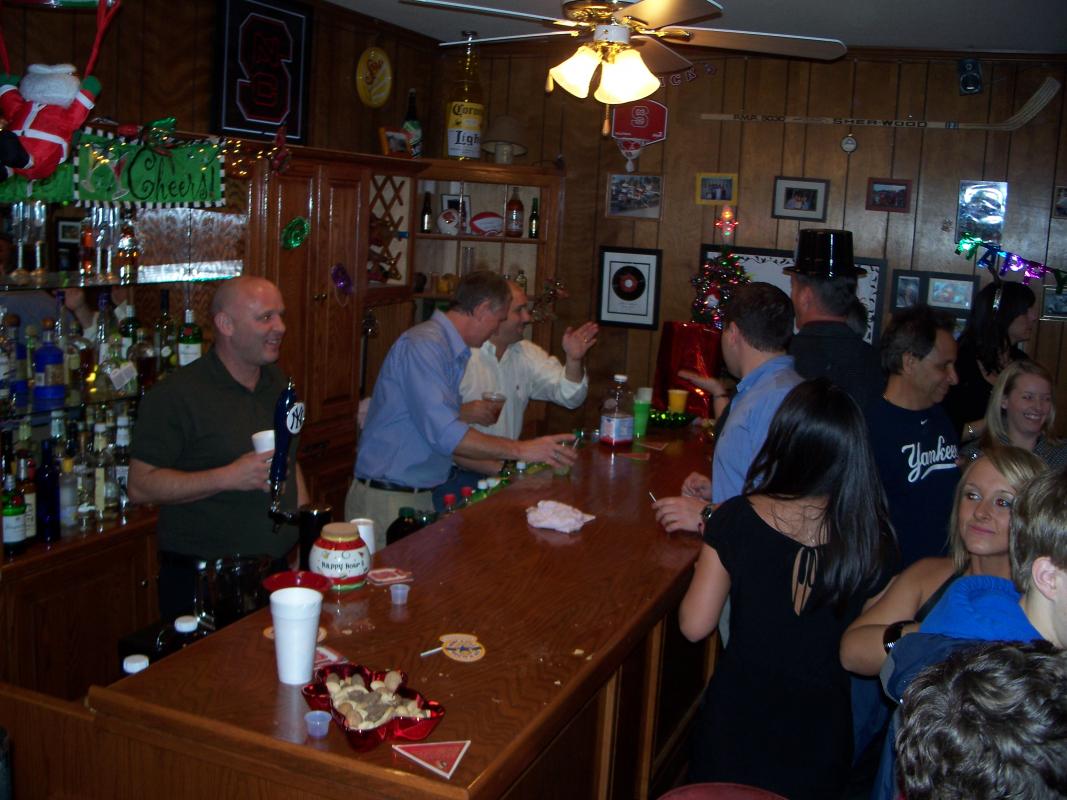 people being served at home bar