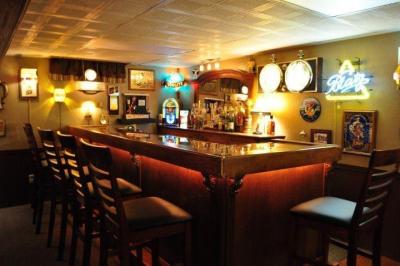 classic basement l-shaped bar photo