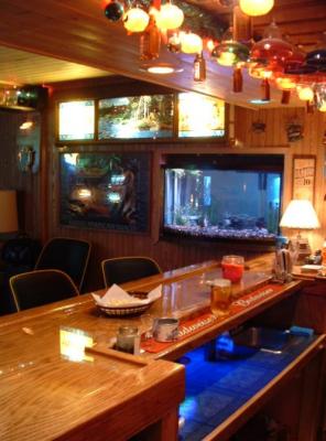 home bar with fish tank and hamms scenerama