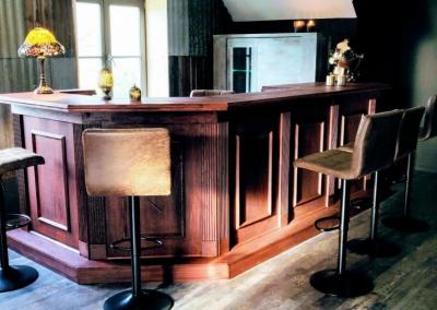 steampunk themed home bar with chairs